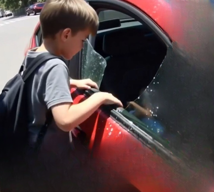 I was walking to school when I saw a baby trapped in a car under