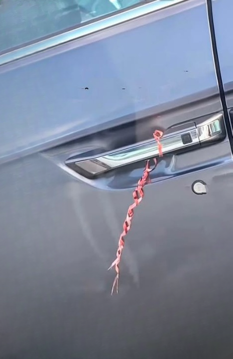 Seeing a Wire Tied Around a Car Door Handle: What It Could Mean