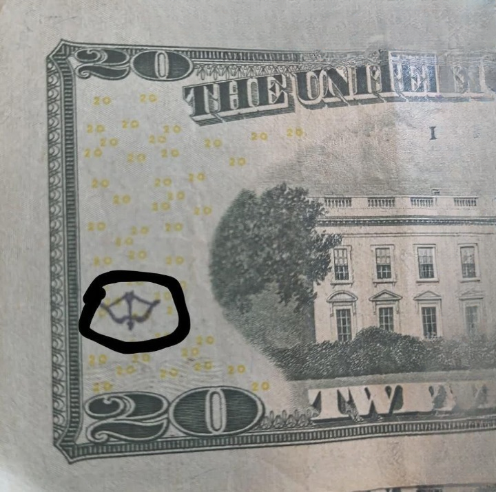 Why Some U.S. Bills Have a Bow and Arrow Mark