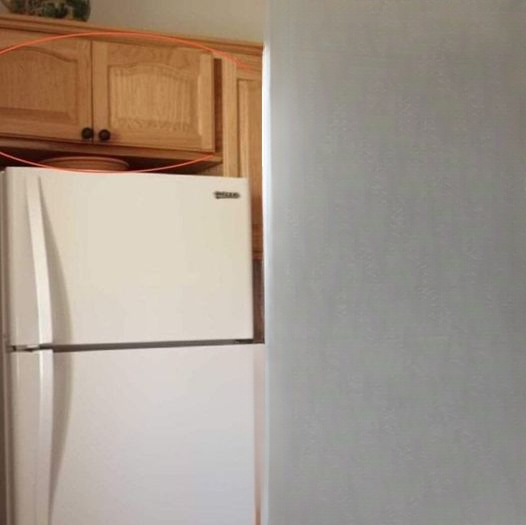 What Are the Cabinets Above Your Fridge Really Used For? Most People Have No Idea