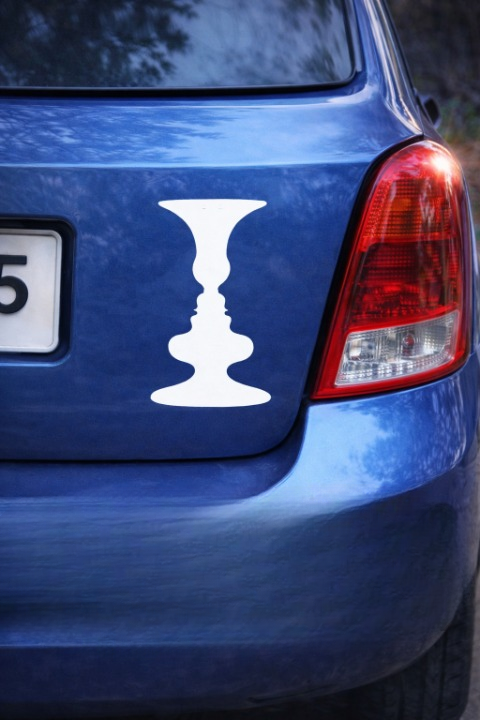 What Is the Symbol on the Back of the Car? A Clear Explanation of the “Faces or Vase” Design