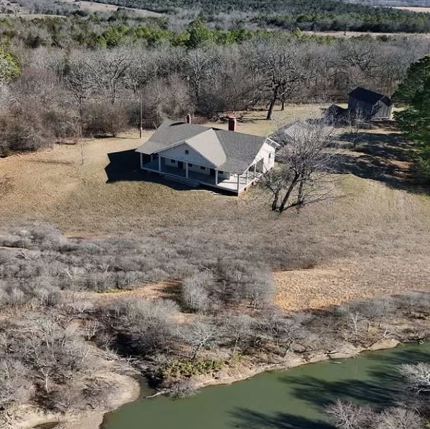 Premier Riverfront Farm Auction in Oklahoma: 140 Acres of Scenic Land, Historic Farmhouse, and Investment Potential