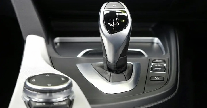 What That Tiny Slot Next to Your Gear Shift Really Does (And Why It Could Save You One Day)