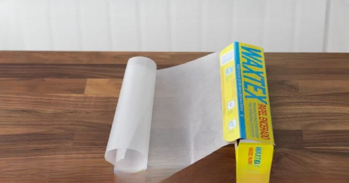 Say Goodbye to Grease and Dust in Your Kitchen with This Simple Wax Paper Cleaning Hack