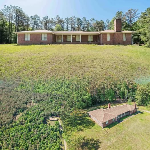 Maximizing Investment Value: 5-Bedroom Brick Ranch on 3 Private Acres in Saulsbury
