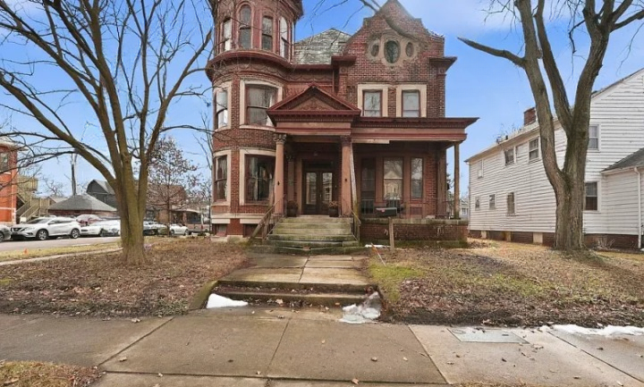 Stunning 1876 Historic Brick Estate with Multi-Unit Layout, Over 4,700 Sq Ft, Income-Generating Potential, Modern Updates, and Timeless Craftsmanship in Fort Wayne